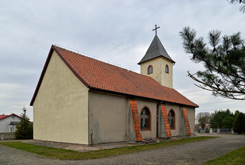 Fototapeta na wymiar The photos show a general view of the Roman Catholic branch church of Saint Joseph in the village of Stożne in Masuria, Poland.