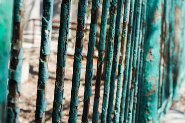 old rusty iron fence bars