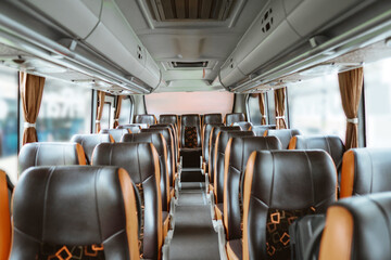 many empty seats without passengers on the bus © Odua Images