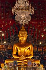 BANGKOK, THAILAND - April 14, 2021: Golden buddha statue in Golden Mount or Wat Saket Golden Mountain Temple famous, is a Buddhist temple in Pom Prap Sattru Phai district, Bangkok. A popular Landmark