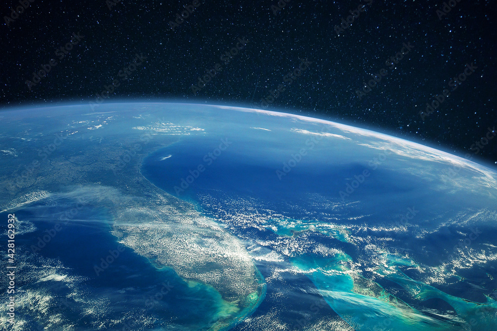 Poster blue planet earth with ocean and continents in open space on the starry sky