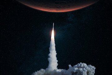 Spaceship takes off and begins a mission to Mars. Rocket with smoke and blast lift off to the red...