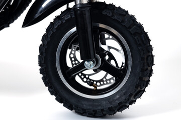 electric scooter wheel with tire tread on the white background