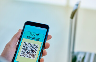 man has a health passport in his smartphone