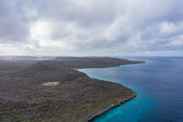 Aerial view above scenery of Curacao, Caribbean with ocean, coast and beach