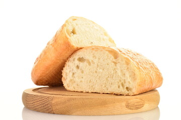 Two halves of fresh fragrant ciabatta on a wooden tray, close-up, isolated on white.
