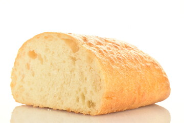 One half fresh aromatic ciabatta, close-up, isolated on white.
