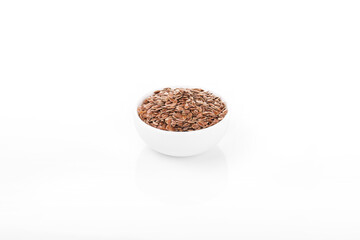 flax seed. flax seed in white bowl on white background. flax, seed.