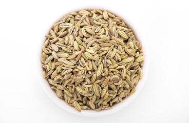 fennel seed. dry fennel seed in white bowl on white background. fennel