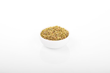 dry oregano. dry oregano spice in white bowl on white background. oregano, dry oregano