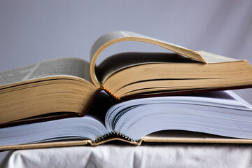 Two books stacked on top of each other