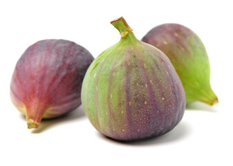 Ripe figs on a white background