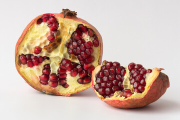 Red ripe juicy garnet fruit pomegranate grains closeup macro 