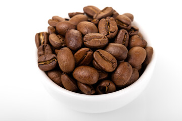 coffee bean. coffee beans in white bowl on white background. roasted coffee,