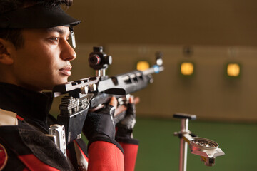 air rifle shooter checking the time.