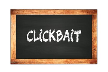 Fototapeta premium CLICKBAIT text written on wooden frame school blackboard.