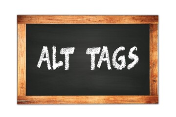 ALT  TAGS text written on wooden frame school blackboard.