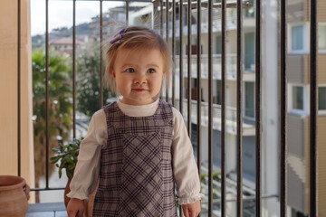 Girl on the balcony at home