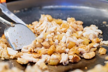 Close up of fried squid egg, thai street food market