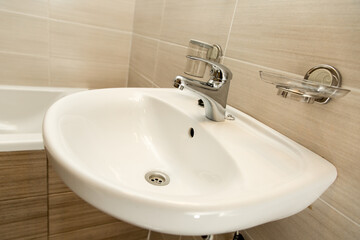 Bathroom with brown tiles