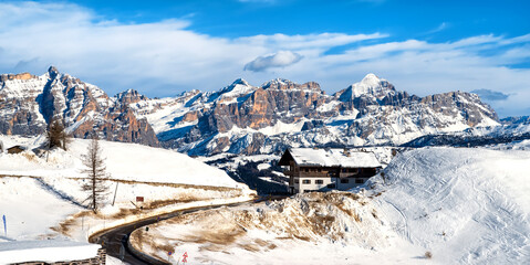 Panorama of Wolkenstein in Gröden in winter with view to the pizes de cir, Grödner Joch and the...