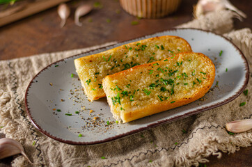 Butter garlic baguette - 428180734