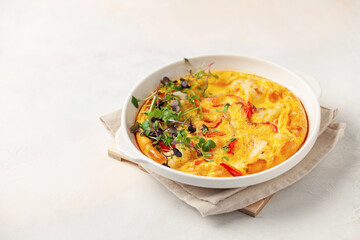 Omelette with vegetables - frittata in skillet