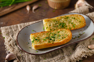 Butter garlic baguette - 428182177