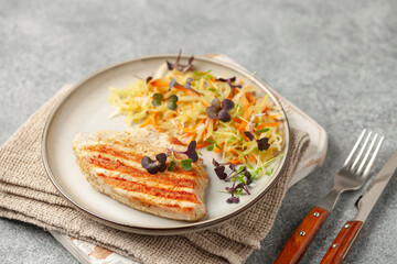 Turkey steak grill with fresh vegetable salad in a plate on the table. Diet nutrition