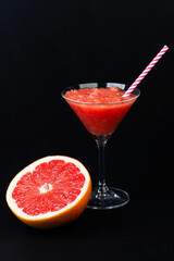 Grapefruit smoothie served in martini glass non-alcohol cocktail