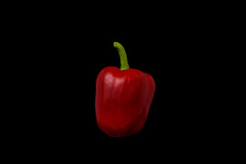 Not a beautiful red bell pepper on a black background