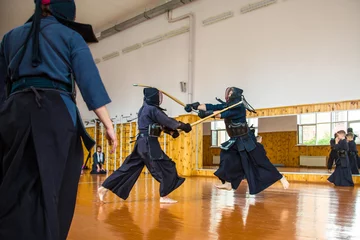 Fotobehang fight with the Kendo Sword School © liubovyashkir