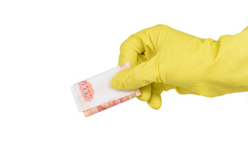 A hand in a rubber glove holds five thousand rubles.
