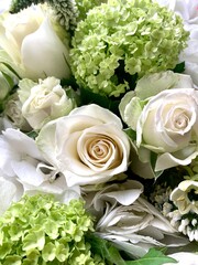 Bouquet of fresh flowers including white roses and hydrengeas 