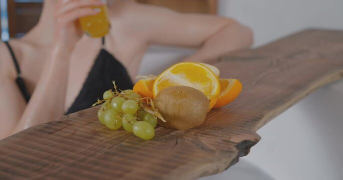 Lesbian is eating fruit in the Jakuzzi Lesbian is drinking juice in the Jakuzzi Lgbtq Gay Lesbians kissing in bed Lesbian Bisexual Transgender Lesbian concept Love