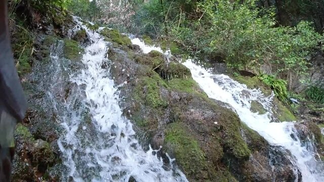 Varone waterfall in slow motion during winter. Italy - Riva del Garda