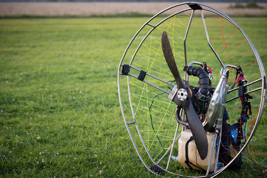 Individual backpack paralet with gasoline engine. Preparation for wing flight. Extreme sports. Paralet and small aircraft.