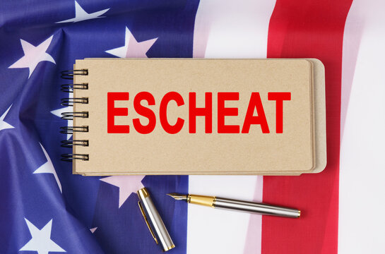 Against the background of the flag of the USA lies a notebook with the inscription - ESCHEAT