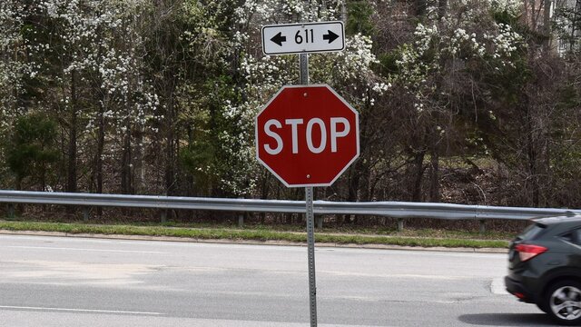 Stop Sign Along the Side of a Road