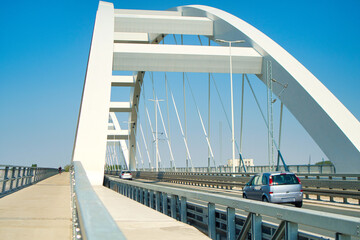 Fototapeta premium Metal bridge support, traffic line and pedestrian lane of new Zezelj bridge in Novi Sad, Serbia