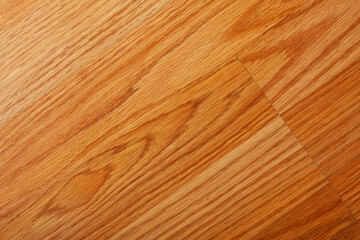 brown laminate diagonally laid on the ground