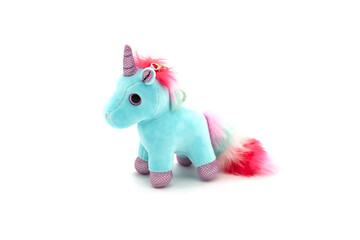 Blue unicorn plush toy. Isolated on white background