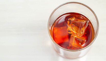 Excellent whisky served with ice cubes in a glass of Old fashioned type