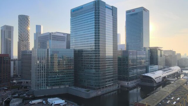 Offices in the financial hub of Canary Wharf at Canada square HSBC, CITI, JP Morgan, KPMG and Barclays buildings aerial.
