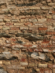 Close up short of old red brick wall 