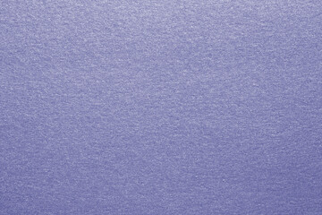 Closeup of a bright seamless pink purple glitter sparkling metal paper texture for christmas gift design, Web, card with shiny surface and copy space for text. Macro.