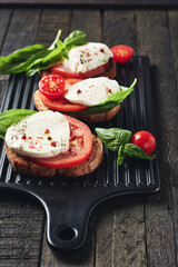 Open caprese sandwiches.