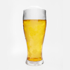 Draft or craft beer in a clear glass with beer foam and bubbles in the glass. Cold alcoholic beverages are popular around the world. On a white background 3D Rendering