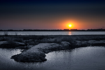 Sunset, sunrise on the calm sea