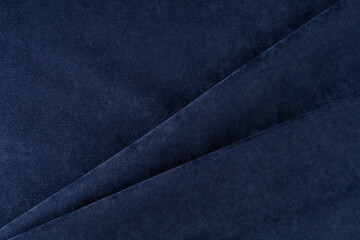 curtain fabric canvas dark blue, draped with diagonal folds